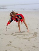 Blanca Blanco Photoshoot in a Red Racing Jacket on a Malibu Beach