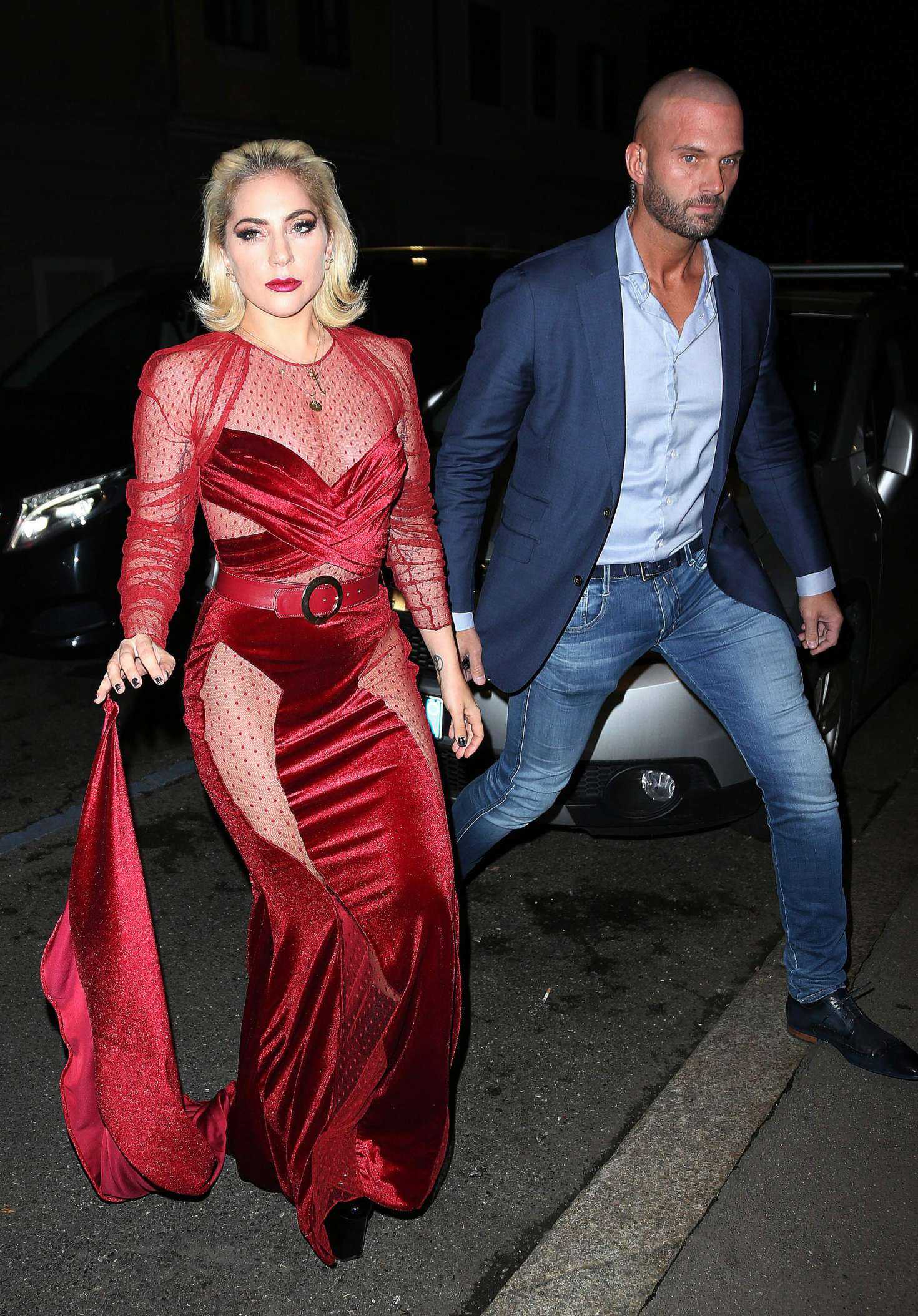 Lady Gaga in See-Through Red Dress Leaving her Hotel in Milan