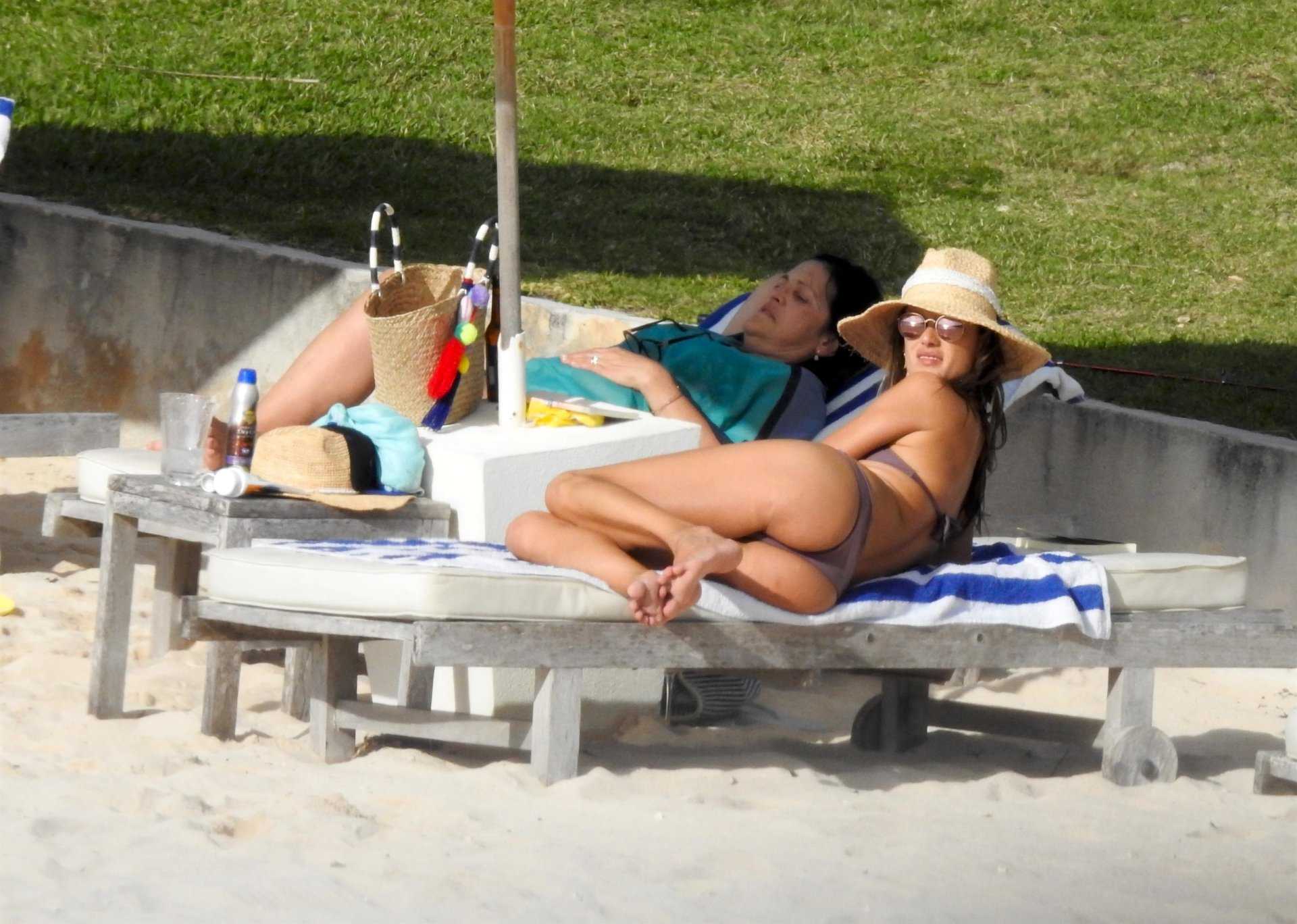 Alessandra Ambrosio in Bikini Relaxing at a Beach in Bahamas