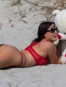 Claudia Romani in Red Lingerie while Playing with a Teddy Bear in Miami