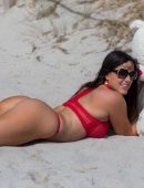 Claudia Romani in Red Lingerie while Playing with a Teddy Bear in Miami