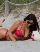 Claudia Romani in Red Lingerie while Playing with a Teddy Bear in Miami