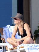 Molly Sims in Black Swimsuit at a Pool in Cabo San Lucas
