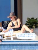 Molly Sims in Black Swimsuit at a Pool in Cabo San Lucas