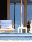 Molly Sims in Black Swimsuit at a Pool in Cabo San Lucas