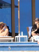 Molly Sims in Black Swimsuit at a Pool in Cabo San Lucas