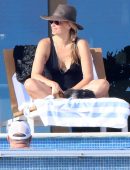 Molly Sims in Black Swimsuit at a Pool in Cabo San Lucas