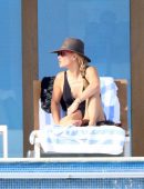 Molly Sims in Black Swimsuit at a Pool in Cabo San Lucas