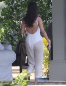 Selena Gomez in White Swimsuit and Pants at a pool and sailing in Montego Bay
