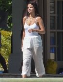 Selena Gomez in White Swimsuit and Pants at a pool and sailing in Montego Bay