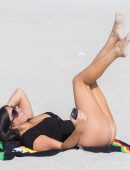 Claudia Romani in Black Swimsuit for Photoshoot at Miami Beach