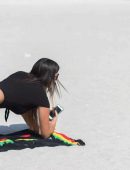 Claudia Romani in Black Swimsuit for Photoshoot at Miami Beach