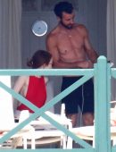 Emma Stone on a Patio with her Boyfriend