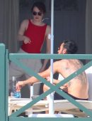Emma Stone on a Patio with her Boyfriend