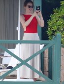 Emma Stone on a Patio with her Boyfriend