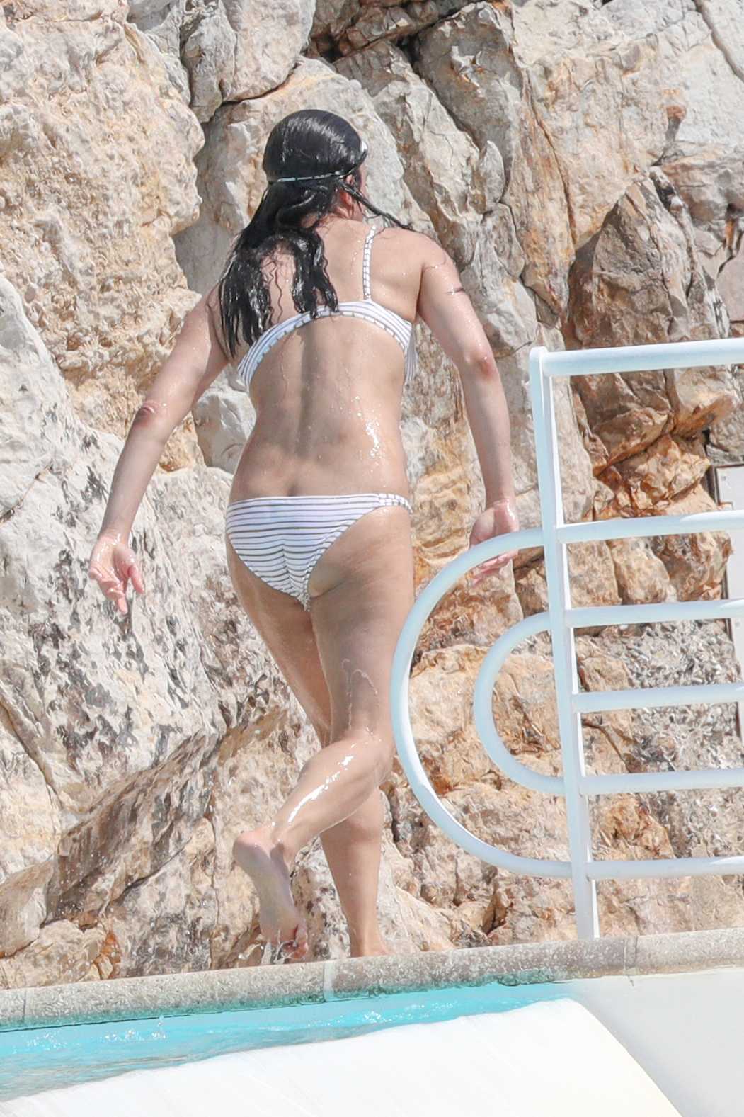 Michelle Rodriguez Swimming at Eden Roc Hotel in Antibes