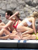 Karlie Kloss in White and Black Bikini on Vacation on a Yacht in Capri