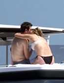 Karlie Kloss in White and Black Bikini on Vacation on a Yacht in Capri