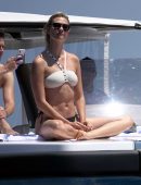 Karlie Kloss in White and Black Bikini on Vacation on a Yacht in Capri