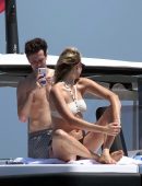 Karlie Kloss in White and Black Bikini on Vacation on a Yacht in Capri