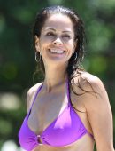 Brooke Burke in Purple Bikini at a Pool in Malibu