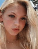 Jordyn Jones in Orange Bikini for Photoshoot at a Beach