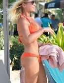 Billie Faiers in Orange Bikini on Holidays at Beach in Dubai