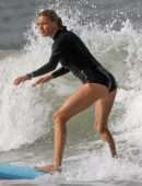 Kelly Rohrbach in Bikini and Swimsuit Surfing in Hawaii