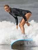 Kelly Rohrbach in Bikini and Swimsuit Surfing in Hawaii