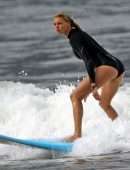 Kelly Rohrbach in Bikini and Swimsuit Surfing in Hawaii