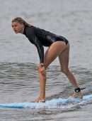 Kelly Rohrbach in Bikini and Swimsuit Surfing in Hawaii
