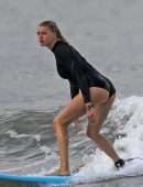 Kelly Rohrbach in Bikini and Swimsuit Surfing in Hawaii