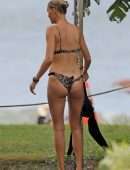 Kelly Rohrbach in Bikini and Swimsuit Surfing in Hawaii