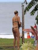 Kelly Rohrbach in Bikini and Swimsuit Surfing in Hawaii