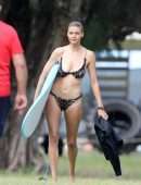 Kelly Rohrbach in Bikini and Swimsuit Surfing in Hawaii