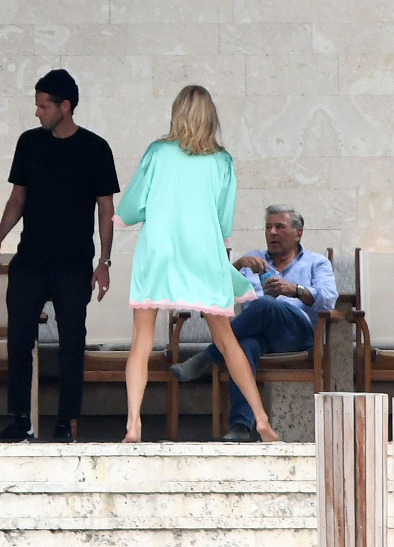 EXCLUSIVE: Victoria's Secret models Elsa Hosk and Barbara Palvin model lingerie while chief marketing officer Ed Razek takes a front row seat