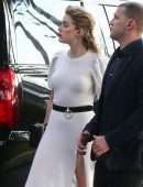 *EXCLUSIVE* Amber Heard shows off a high slit white dress while leaving an interview at Univision Headquarters