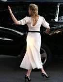 *EXCLUSIVE* Amber Heard shows off a high slit white dress while leaving an interview at Univision Headquarters