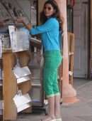 Blanca Blanco Walking to the News Stand to Buy a Magazine