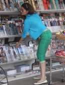 Blanca Blanco Walking to the News Stand to Buy a Magazine