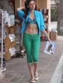 Blanca Blanco Walking to the News Stand to Buy a Magazine