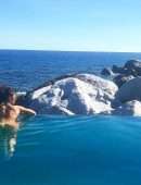 Sarah Hyland – Skinny Dipping in a Pool in the Virgin Islands