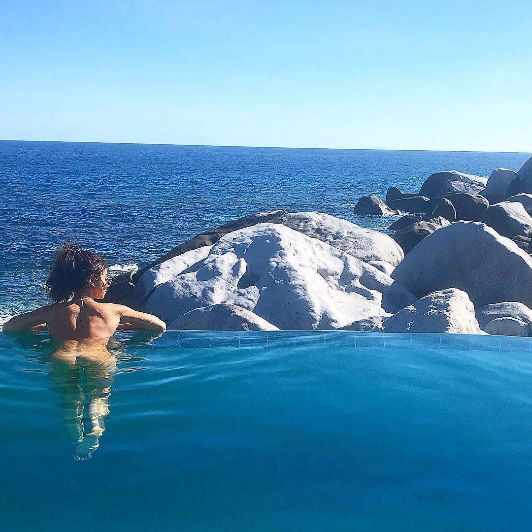 Sarah Hyland – Skinny Dipping in a Pool in the Virgin Islands