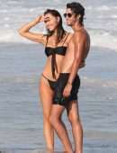 Alexis Ren in Black Bikini at a Beach in Tulum