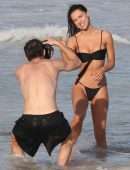 Alexis Ren in Black Bikini at a Beach in Tulum