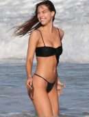 Alexis Ren in Black Bikini at a Beach in Tulum