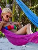 Ashley James in Bikini on the Beach in Zanzibar