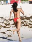 Padma Lakshmi in Red Bikini at Beach in Miami