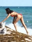 Padma Lakshmi in Red Bikini at Beach in Miami