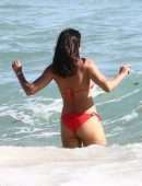 Padma Lakshmi in Red Bikini at Beach in Miami
